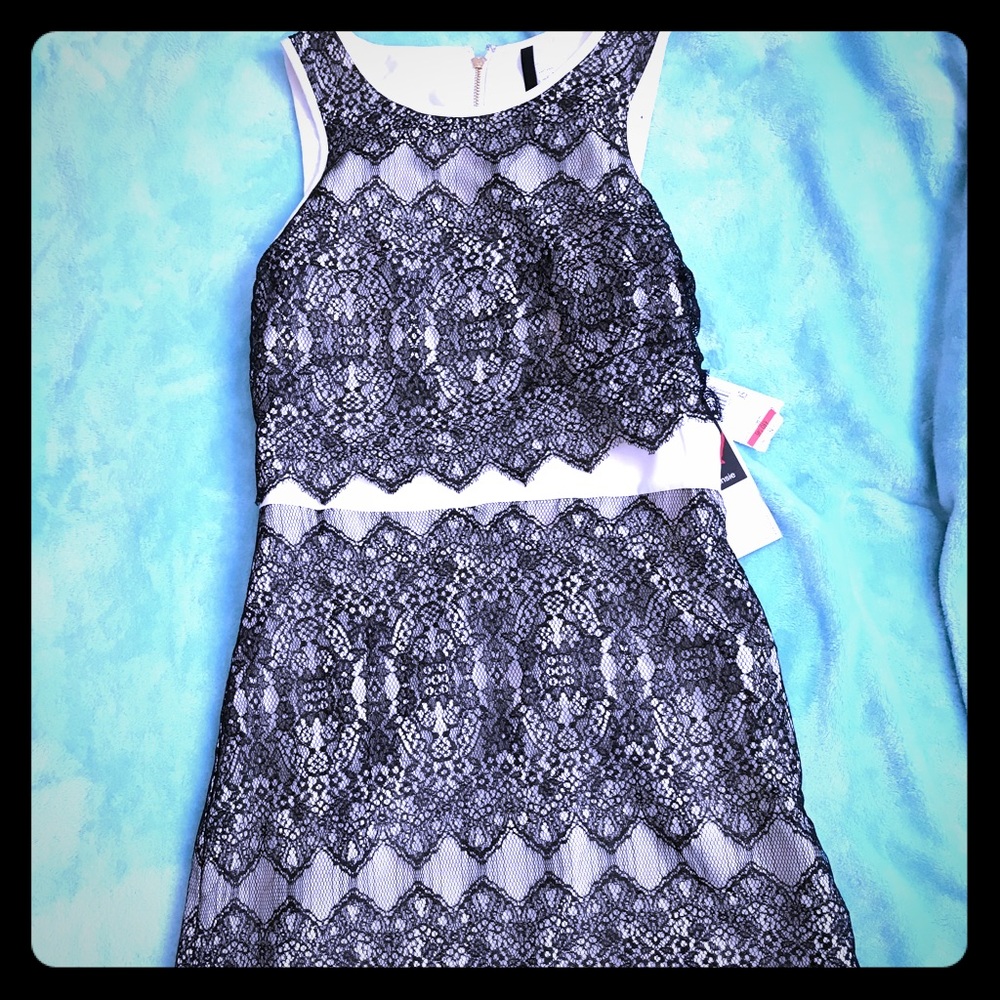 Black and cream colored dress with lace